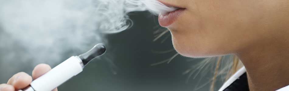 Woman vaping e-cig
